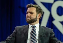 South Park’s VILE Trump Attack Shocks America Man in a suit with a thoughtful expression.