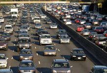 Massive Surveillance Scandal: Millions of Drivers Tracked Heavy traffic on a multi-lane highway.
