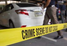 Grandmother’s Drunk Crash KILLS Grandson Crime scene tape blocking off white sedan.