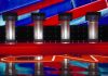 Four debate podiums on a CNN stage background