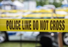 Father Sends Chilling Warning Before Tragedy Yellow police line tape with Do Not Cross.