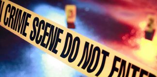 Crime scene tape with do not enter text