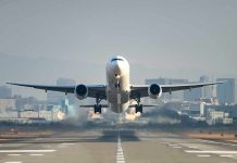 Thanksgiving Travel Nightmare: Shutdown Grounds Millions An airplane taking off from an airport runway