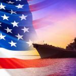 Trump’s New Strategy SHOCKS Washington American flag overlaying warship at sunset.