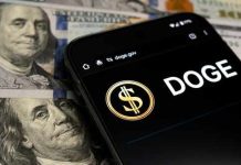 Crypto Student TORTURED – Wallets Drained Alive Smartphone displaying Doge logo on hundred dollar bills