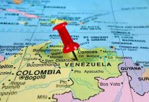 Red pin on Venezuela, South America map.