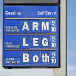Gas station price sign displaying fuel prices