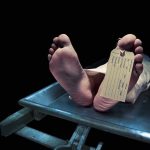TARGETED Hit Rocks California – Doctor DEAD Feet of a deceased person on a coroners table with an identification tag