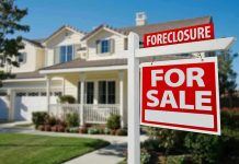 Trump’s Housing Plan Could Lock Buyers In Foreclosure sign in front of a house for sale