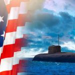 3 Nuclear Subs Surface on Purpose American flag and submarine at sea under a cloudy sky.