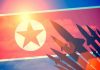 North Korean flag with missile silhouettes.