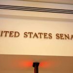 Lone Republican Votes Against the SAVE America Act! Sign displaying United States Senate in a government building