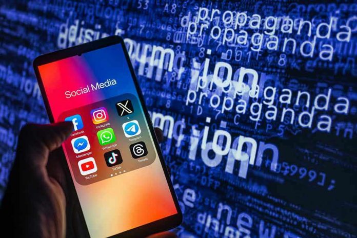 2378698417 Smartphone showing social media apps with text background.