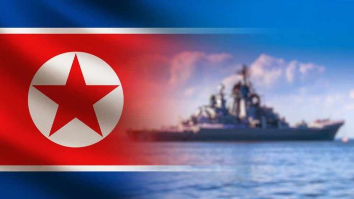 North Korean flag overlay with warship at sea