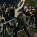 Protesters clash with police outside immigration detention center in New Jersey