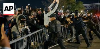 Protesters clash with police outside immigration detention center in New Jersey