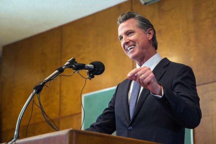 A man in a suit delivering a speech at a podium with microphones