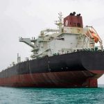 Large oil tanker anchored in calm sea
