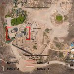Aerial view through drone HUD of archaeological ruins and surrounding campsite