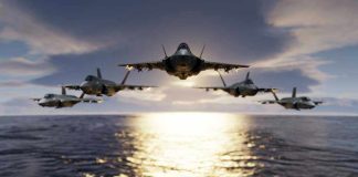Five jets flying low over the ocean at sunset.