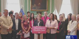 Signing new abortion law, Healey cites stories of 'anguish and heartache'
