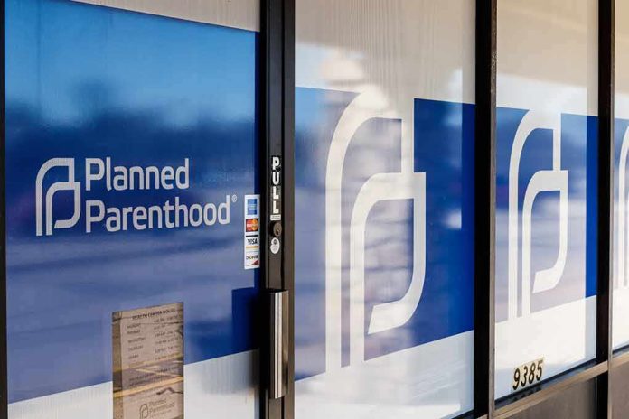 Planned Parenthood clinic entrance with blue logo panels