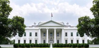 The White House with fountain and red flower bed