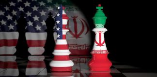 Trump Responds To Iran’s Recent Hormuz Offer Chess kings with United States and Iran flags facing each other