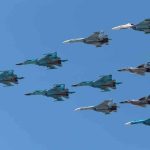 Trump Orders Scaling Back War Games Near North Korea A formation of military jet fighters flying in a clear blue sky