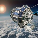U.S. Spy Satellite MYSTERIOUSLY Breaks Apart in Orbit Satellite with solar panels orbiting above Earth’s clouds