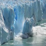 Scientist Say This Is SUPERCHARGING Europe’s Heatwaves A glacier calving into the ocean, creating a splash of ice and water