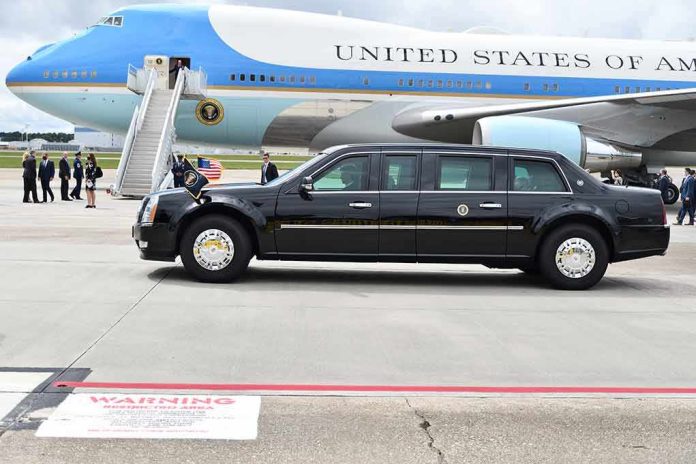 Presidential motorcade limousine parked beside large blue and white aircraft