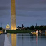 Washington Monument and reflecting pool at dusk