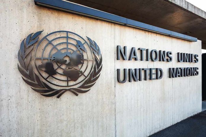 United Nations emblem and signage on a concrete wall