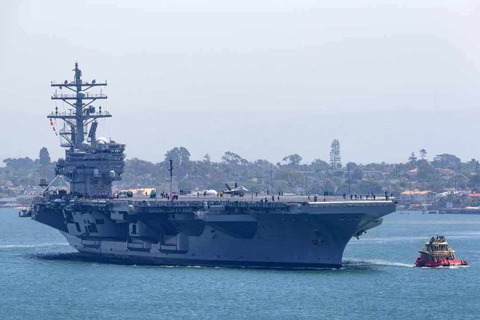 Aircraft carrier escorted by a tugboat in a harbor