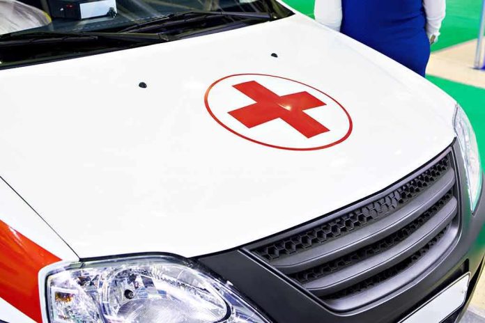 shutterstock_2094911230 ambulance hood with red cross symbol