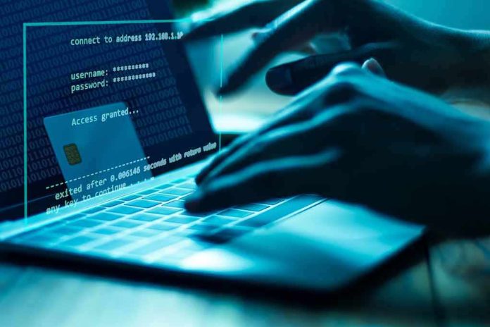 Hands typing on a laptop with cybersecurity login overlay
