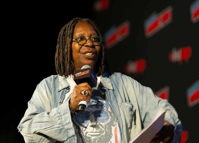 Speaker with microphone on stage