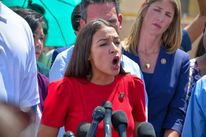 shutterstock_1439783048 Judy Chu among crowd as a woman in red speaks at outdoor press event