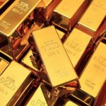 Gold bars stacked closely together