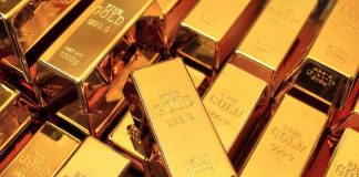 Gold bars stacked closely together
