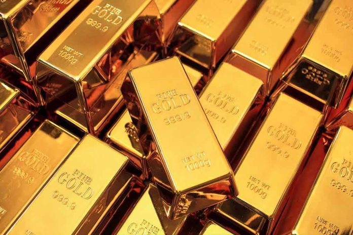 Gold bars stacked closely together