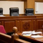 Burqa-Clad Woman HIJACKS County Meeting empty courtroom with judge's bench and microphones