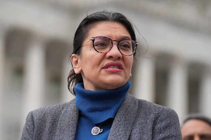 woman in glasses speaking outdoors