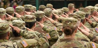 Fort Hood Shooter Livestream Execution FINALIZED Soldiers in camouflage uniforms salute in formation